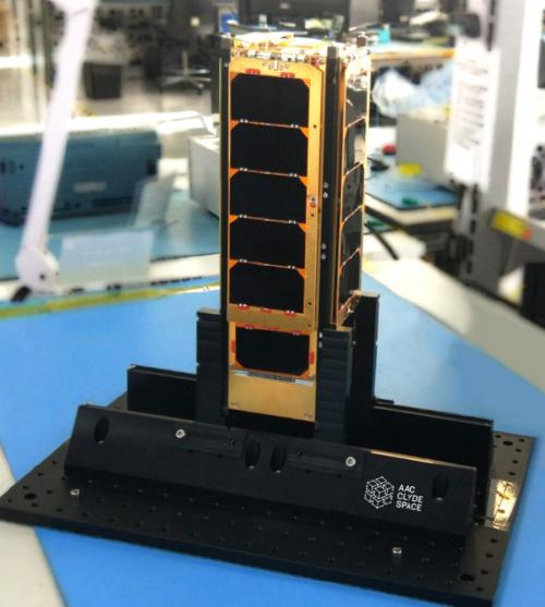 The golden CubeSat PICASSO.